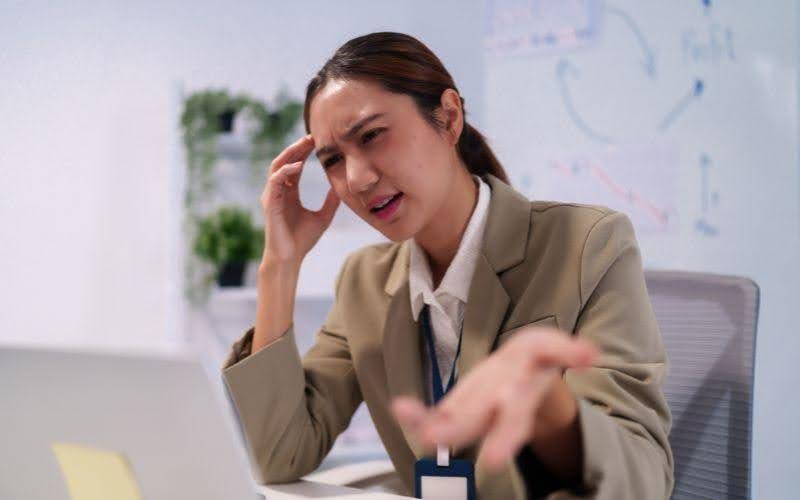 Wealthlink Inc. | From Shortage to Staffing: Solving High-Volume Hiring in the Philippines Wealthlink Inc. | stressed-businesswoman-office